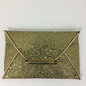 Gold envelope clutch bag. Brand new